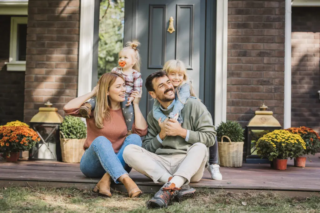 young family enjoying in sunny day