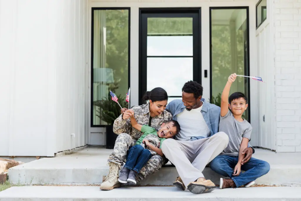 happy military family celebrating at home